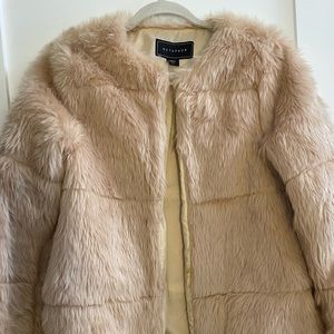 Blush faux fur coat